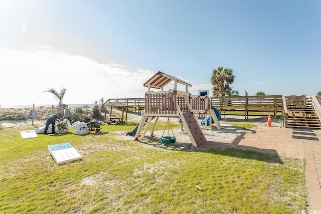 view of jungle gym featuring a yard