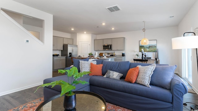 living room with wood-type flooring