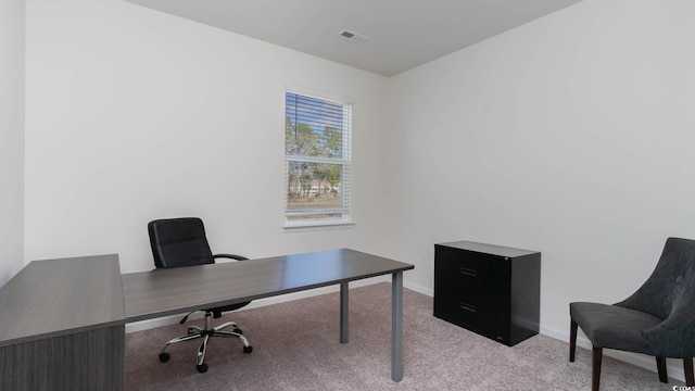 home office featuring light carpet