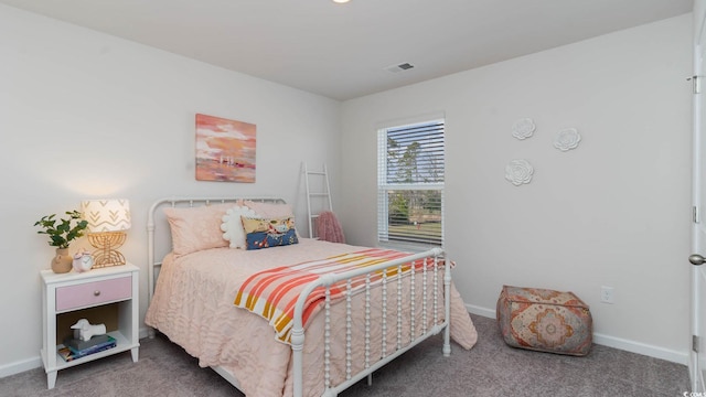 bedroom featuring carpet