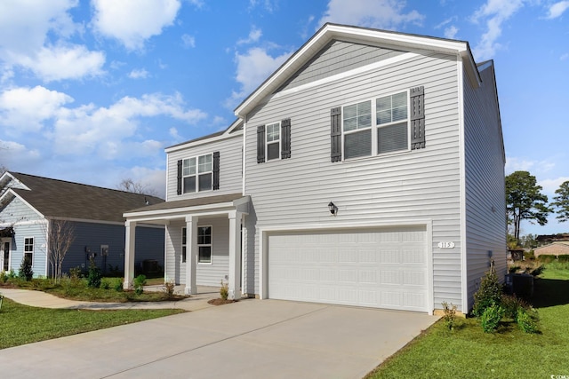 view of front property with a front lawn, central AC, and a garage