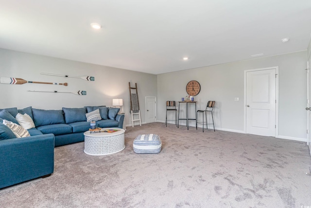 carpeted living room featuring a wealth of natural light