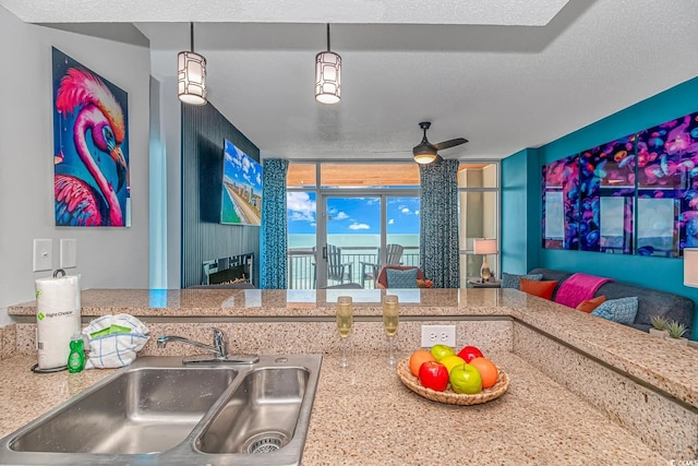 5300 N Ocean Blvd Unit 1405, Myrtle Beach, SC 29577 - kitchen with a ceiling fan and a sink