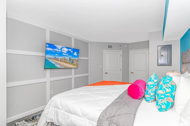 5300 N Ocean Blvd Unit 1405, Myrtle Beach, SC 29577 - bedroom with wood finished floors and electric panel