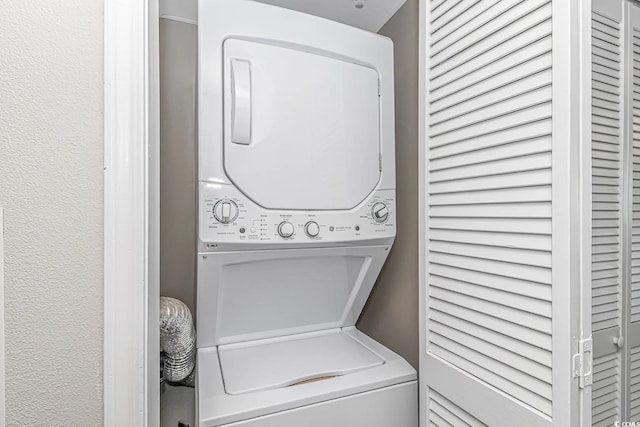 5300 N Ocean Blvd Unit 1405, Myrtle Beach, SC 29577 - laundry area featuring stacked washer / dryer and laundry area