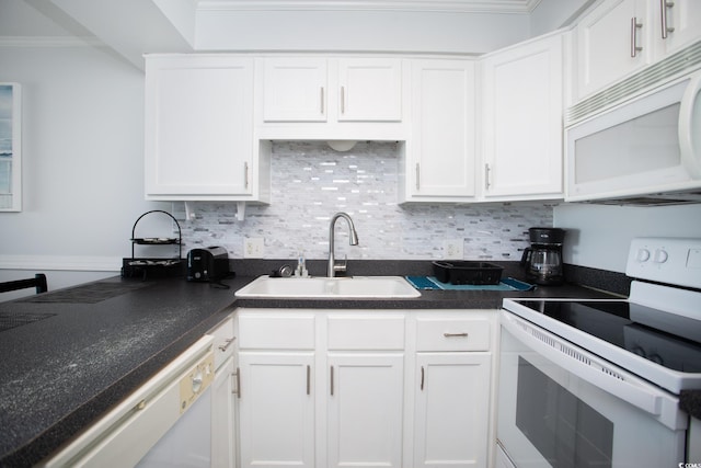 kitchen featuring sink, white cabinetry, crown molding, and white appliances