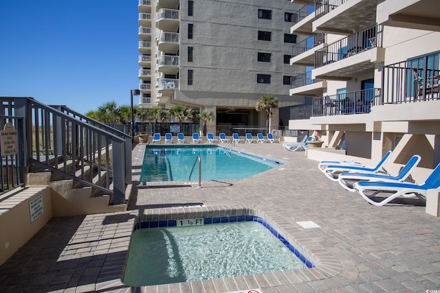 view of pool with a patio area