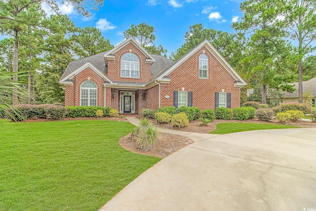 view of property featuring a front yard