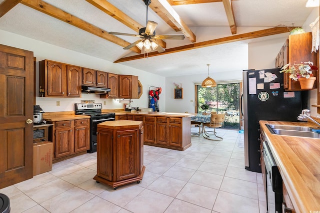 kitchen featuring stainless steel appliances, wooden counters, a peninsula, under cabinet range hood, and light tile patterned floors