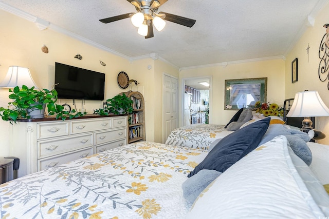 bedroom with crown molding, a textured ceiling, and ceiling fan