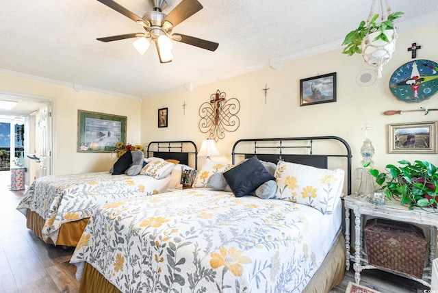 bedroom with dark hardwood / wood-style flooring, crown molding, a textured ceiling, and ceiling fan