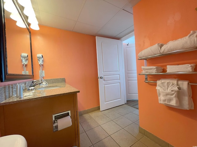 bathroom featuring tile patterned floors and vanity