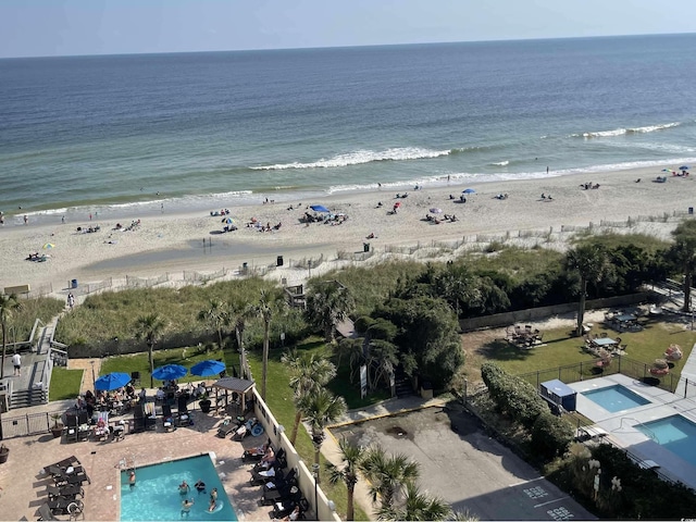 bird's eye view with a beach view and a water view