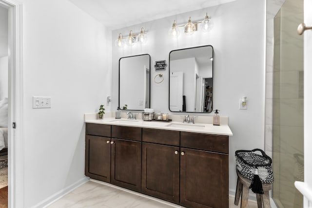 bathroom featuring vanity and a shower with door