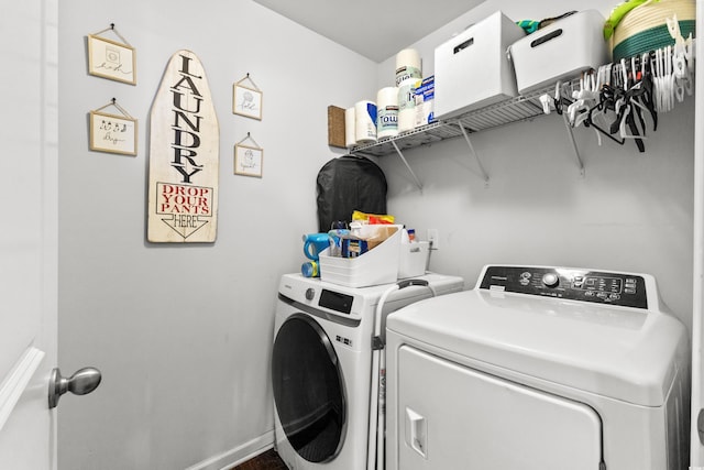 laundry area featuring washer and clothes dryer