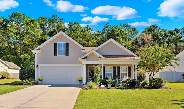 view of front of house with a front yard and a garage