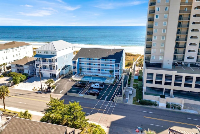 aerial view with a view of the beach and a water view