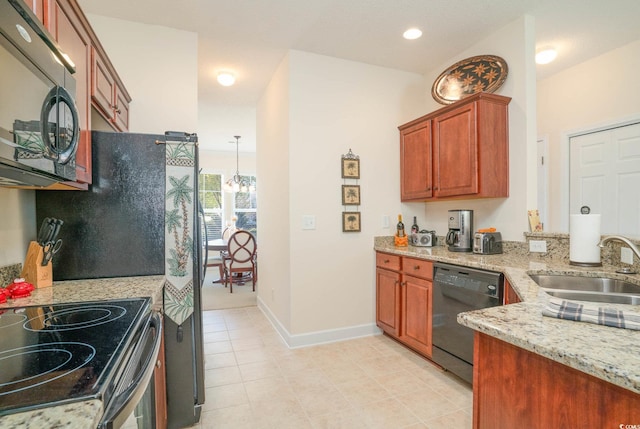 206 Mossy Stone Ct Unit 1605, Murrells Inlet, SC 29576 - kitchen with black appliances, a sink, light stone counters, light tile patterned floors, and baseboards