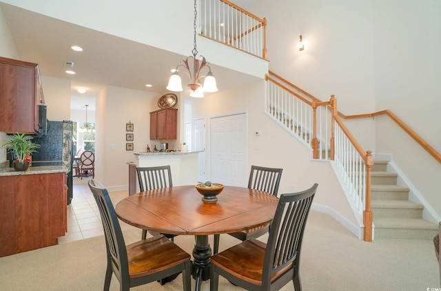 206 Mossy Stone Ct Unit 1605, Murrells Inlet, SC 29576 - dining room featuring stairway, a chandelier, recessed lighting, a high ceiling, and light colored carpet
