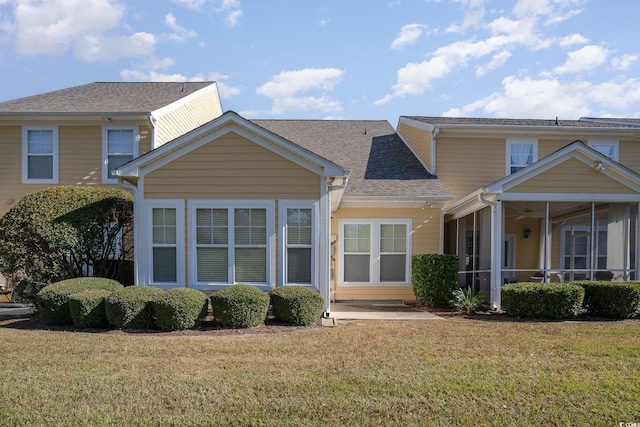 206 Mossy Stone Ct Unit 1605, Murrells Inlet, SC 29576 - view of front facade with a sunroom, a front lawn, and a shingled roof
