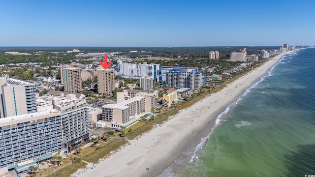 aerial view with a water view and a view of the beach