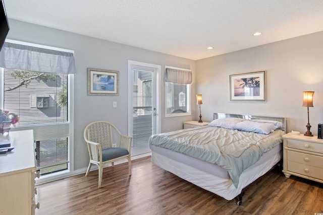 bedroom featuring dark hardwood / wood-style floors