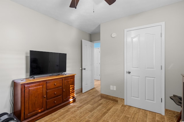 bedroom featuring ceiling fan and light wood-type flooring