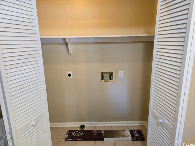 laundry room with washer hookup, electric dryer hookup, and tile patterned floors