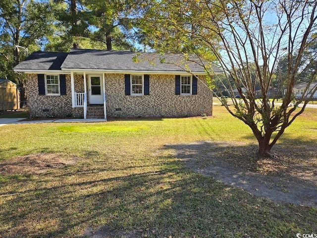 ranch-style home with a front lawn