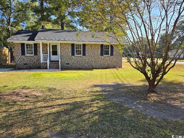 single story home with a front yard