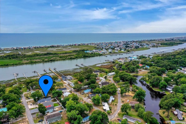 bird's eye view with a water view