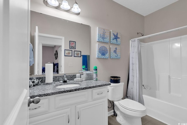 full bathroom with toilet, vanity, tile patterned floors, and shower / tub combo