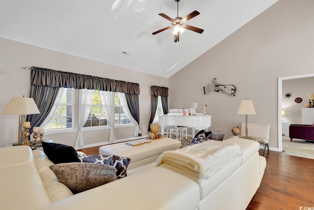 living room featuring ceiling fan, high vaulted ceiling, and dark hardwood / wood-style flooring