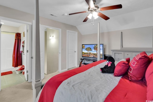 carpeted bedroom featuring ceiling fan and vaulted ceiling