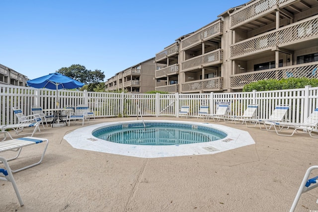 view of swimming pool with a patio area