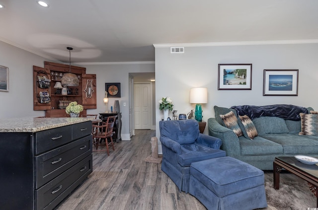 118 Salt Marsh Cir Unit 25-I, Pawleys Island, SC 29585 - living area with ornamental molding, wood finished floors, recessed lighting, and baseboards