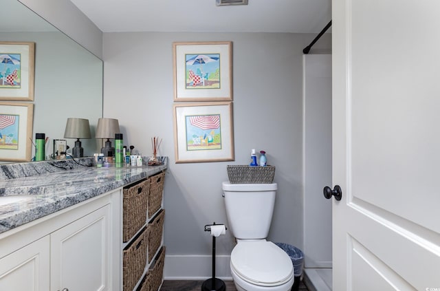 118 Salt Marsh Cir Unit 25-I, Pawleys Island, SC 29585 - bathroom featuring vanity, toilet, and baseboards