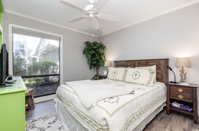 118 Salt Marsh Cir Unit 25-I, Pawleys Island, SC 29585 - bedroom featuring wood finished floors, crown molding, a baseboard radiator, and ceiling fan