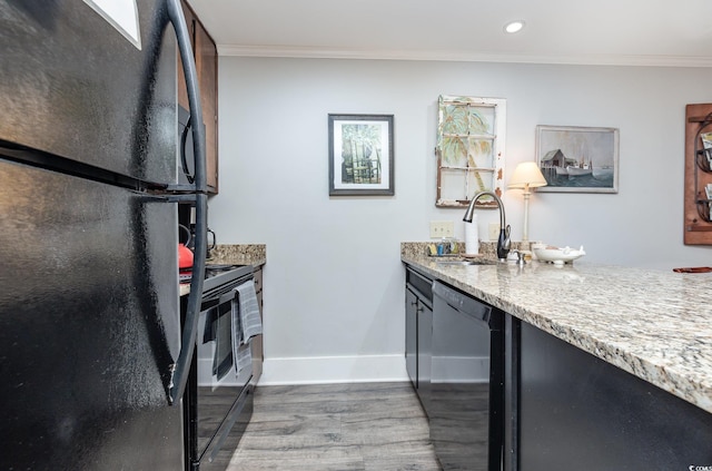 118 Salt Marsh Cir Unit 25-I, Pawleys Island, SC 29585 - kitchen with black appliances, a sink, crown molding, wood finished floors, and baseboards