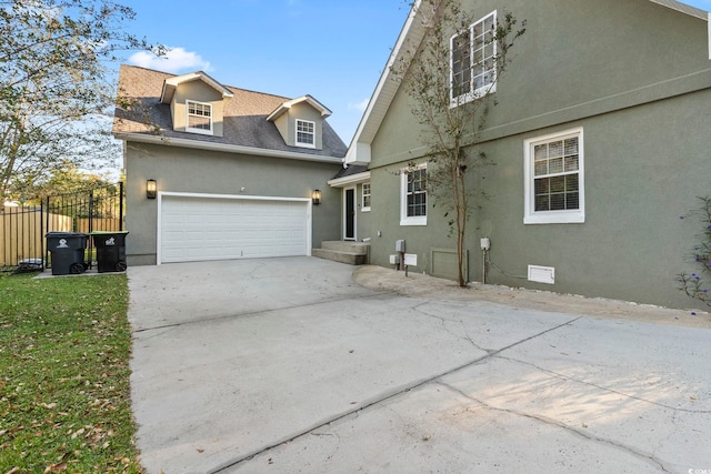 exterior space with a garage