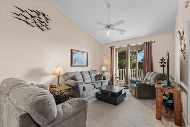 carpeted living room featuring high vaulted ceiling and ceiling fan