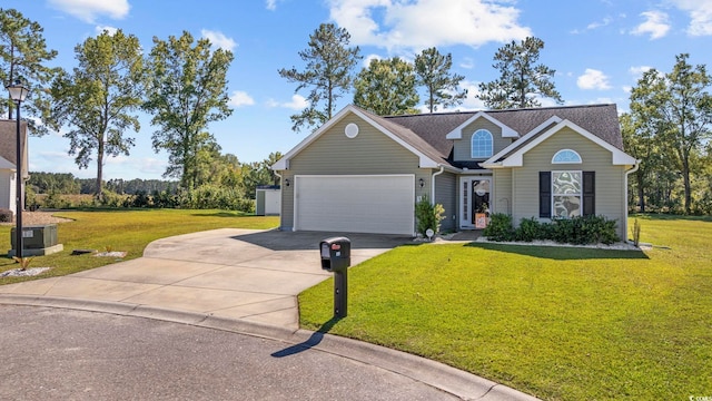 view of front of property with a garage and a front lawn