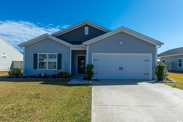 view of front of home featuring board and batten siding, a garage, a front lawn, and concrete driveway