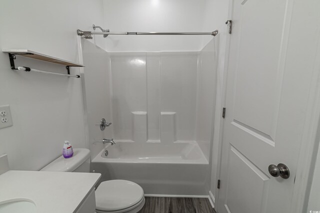 bathroom with hardwood / wood-style floors and walk in shower