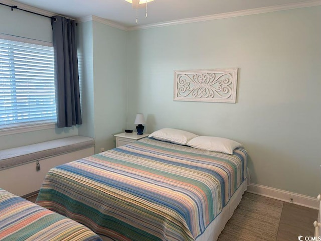 bedroom with crown molding