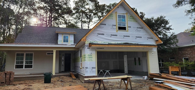 property in mid-construction with a garage