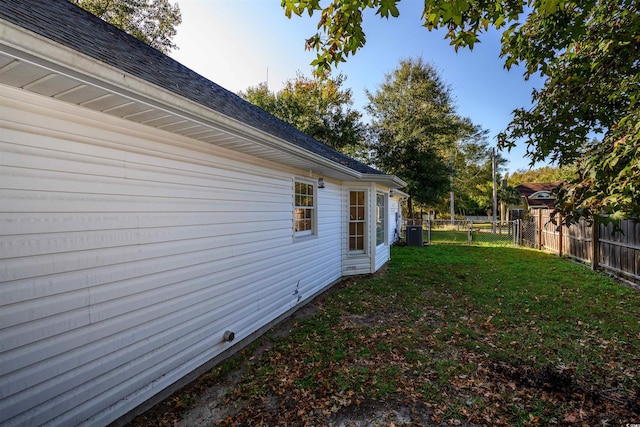 view of yard featuring central AC unit