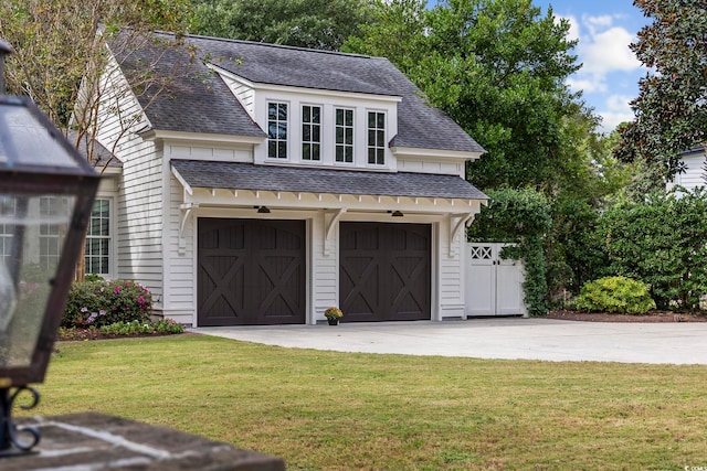 garage with a yard