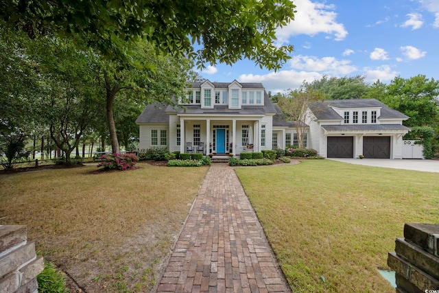 view of front of house with a front lawn and covered porch