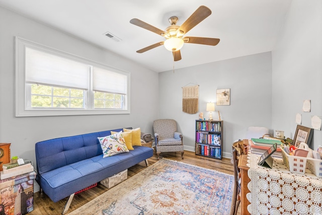 1412 Hemingway St, Myrtle Beach, SC 29577 - living room featuring wood finished floors, visible vents, a ceiling fan, and baseboards